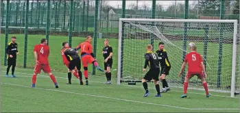  ??  ?? Craig MacEwan flashes a header across the face of goal.