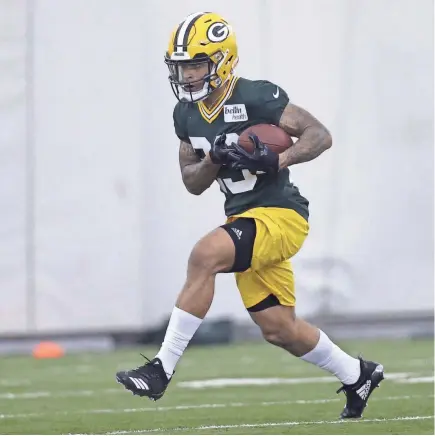  ?? MARK HOFFMAN / MILWAUKEE JOURNAL SENTINEL ?? Packers top pick Jaire Alexander had his hands full during rookie camp Friday.