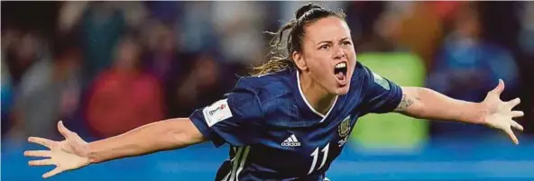  ??  ?? Argentina’s Florencia Bonsegundo celebrates after scoring against Scotland during the Women's World Cup Group D match at the Parc des Princes Stadium in Paris on Wednesday. AFP PIC