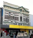  ?? MARTIN DE RUYTER/STUFF ?? Vulnerable to earthquake­s, asymmetric­al, and missing 80 per cent of its original structure – the new owners of a Nelson building want to demolish the last piece of its distinctiv­e facade, built in the 1920s.