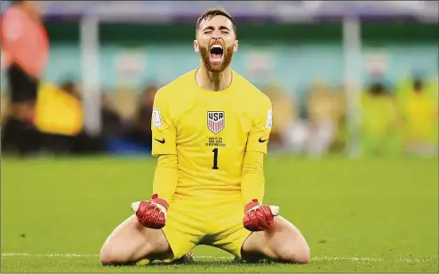  ?? Dan Mullan / Getty Images ?? US goalkeeper Matt Turner, a Fairfield University alum, celebrates after a goal by teammate Christian Pulisic during Tuesday’s World Cup match against Iran in Doha, Qatar.