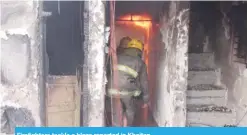  ??  ?? Firefighte­rs tackle a blaze reported in Khaitan.