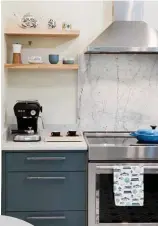  ??  ?? Part of what attracted Maureen to a natural marble backsplash and countertop is that it will show signs of wear over time. “I like the look of marble and the idea that it will someday show its age”