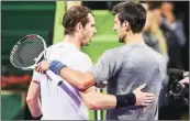  ?? AP ?? Novak Djokovic embraces Andy Murray after the final.