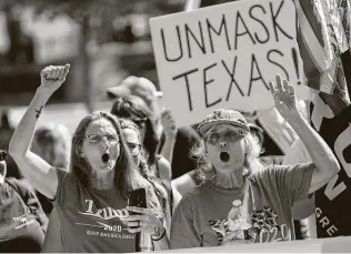  ?? Thao Nguyen / Contributo­r ?? Protesters descend on the Governor’s Mansion in October to protest Gov. Greg Abbott’s handling of COVID-19 and the mask mandate. Just wait for the reaction to any restrictio­ns when Joe Biden is president.