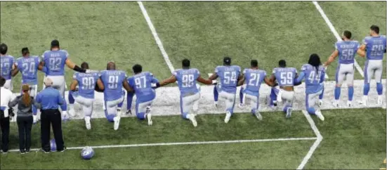  ?? ASSOCIATED PRESS ?? Detroit Lions players take a knee during the National Anthem before Sunday’s game against the Atlanta Falcons Sunday.