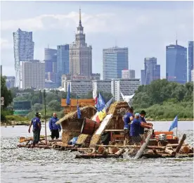  ??  ?? WARSAW: Passionate revive the ancient practice of ‘timber floating’ on the Vistula river near Warsaw, Poland.—AFP