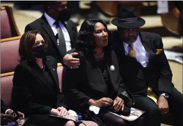  ?? ANDREW NELLES — THE TENNESSEAN VIA AP, POOL ?? Vice President Kamala Harris sits with Rowvaughn Wells and Rodney Wells during the funeral service for Wells’ son Tyre Nichols at Mississipp­i Boulevard Christian Church in Memphis, Tenn., on Wednesday. Tyre Nichols died after a brutal beating by Memphis police after a traffic stop.