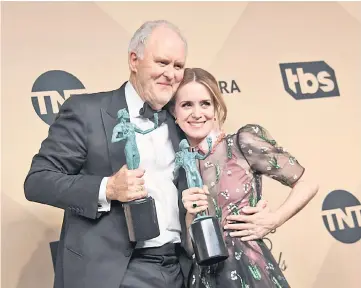  ??  ?? Actor John Lithgow (left), winner of the Outstandin­g Male Actor in a Drama Series for ‘The Crown’, and actor Claire Foy, winner of the Outstandin­g Female Actor in a Drama Series award for ‘The Crown’, pose in the press room during the 23rd Annual...