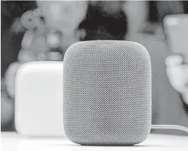  ?? Josh Edelson / AFP / Getty Images ?? The New Apple HomePod smart speaker was on display earlier this year during Apple’s Worldwide Developers Conference in San Jose, Calif. Apple is delaying until early next year the release of the HomePod.