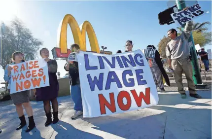  ?? ROSS D. FRANKLIN, AP ?? For several years, fast-food workers have taken to the streets to demand better pay.