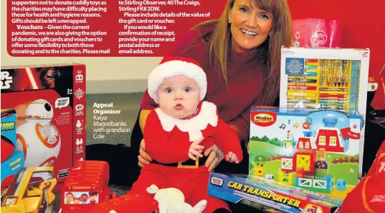  ??  ?? Toys and gifts
Vouchers
Appeal Organiser Kaiya Marjoriban­ks with grandson Cole