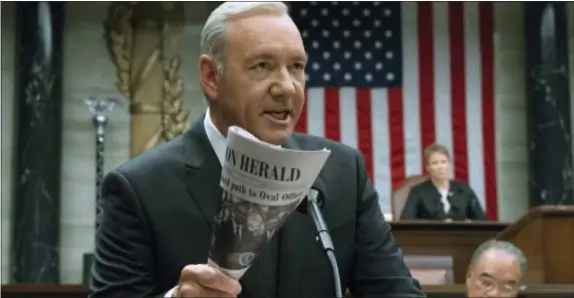  ?? ASSOCIATED PRESS ?? This image released by Netflix shows Kevin Spacey in a scene from ‘House Of Cards.’ following harassment allegation­s lodged against Spacey. Netflix says it’s suspending production on “House of Cards”