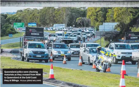  ?? Picture: JERAD WILLIAMS ?? Queensland police were checking motorists as they crossed from NSW to Queensland at the Gold Coast Hwy at Bilinga.