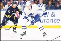  ??  ?? In this, Feb 16, 2020 file photo, Toronto Maple Leafs forward Jason Spezza (19) controls the puck during the second period of the team’s NHL hockey
game against the Buffalo Sabres in Buffalo, NY. (AP)