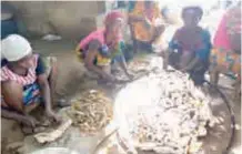  ??  ?? Fresh fish being smoked at Edeha community, Koton-Karfe Local Government area of Kogi State