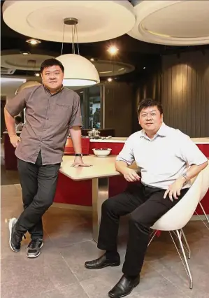  ??  ?? Top notch service: Tay (right) and his brother, Elvin, know that patience plays a big role in helping their clients build their dream homes. By LIM WING HOOI winghooi@thestar.com.my