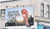  ?? PHOTO: GREGOR RICHARDSON ?? Fruitful? A billboard in Great King St, Dunedin, advertisin­g the Work the Seasons scheme which was first introduced in 2018, before Covid19.