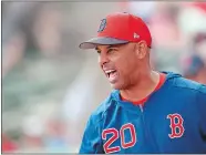  ?? JOHN BAZEMORE/AP PHOTO ?? Boston Red Sox manager Alex Cora talks with Minnesota Twins players before the start of a spring training game on March 13 at Fort Myers, Fla.