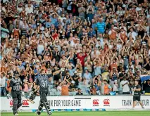  ?? PHOTOSPORT ?? Fans in the crowd during the T20 match between the Black Caps and Australia at Eden Park last Friday.