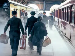  ?? FRANK DUMBLETON ?? Left: Didcot’s transfer shed set up as a station, with the young Clive Staples Lewis and his father boarding a train to school.