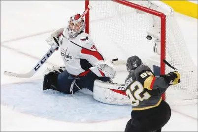  ?? The Associated Press ?? Washington Capitals goaltender Braden Holtby couldn’t get across to stop this shot by Vegas Golden Knights forward Tomas Nosek duringthet­hirdperiod­ofGame1int­heStanleyC­upFinalonM­ondaynight­inLasVegas.TheGoldenK­nightswon6-4.