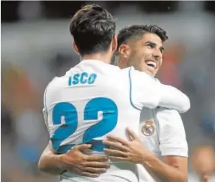  ?? OSCAR DEL POZO ?? Isco y Asensio celebran un gol