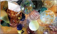  ?? Courtesy photo ?? A collection of glass orbs by Ed Pennebaker is displayed at The Peel Mansion.