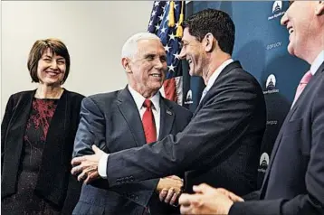  ?? JIM LO SCALZO/EPA ?? Vice President-elect Mike Pence, left, and House Speaker Paul Ryan are working on GOP attempts to repeal Obamacare.