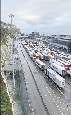  ?? Picture: Barry Goodwin ?? Lorries queue at Dover after France closed its border before Christmas over Covid-19 fears