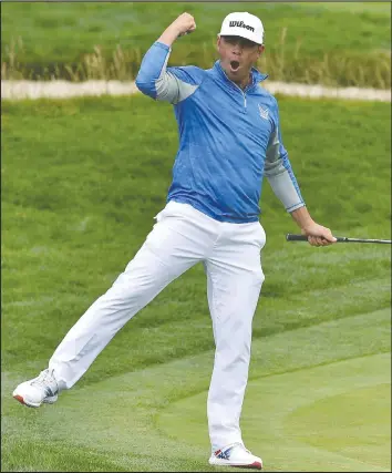  ?? USA TODAY ?? Gary Woodland celebrates after chipping in a shot for par on the 12th hole during the third round of the U.S. Open at Pebble Beach Golf Links yesterday.