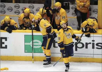  ??  ?? Nashville Predators' players react after their 2-0 loss to the Pittsburgh Penguins in Game 6 of the NHL hockey Stanley Cup Final on Sunday in Nashville, Tenn. AP PHOTO