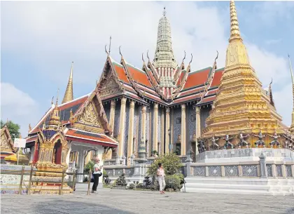  ?? ARNUN CHONMAHATR­AKOOL ?? Wat Phra Sri Rattana Satsadaram (Wat Phra Kaeo) in the Grand Palace, which would normally be crowded with tourists, particular­ly Chinese visitors, looks almost deserted as the Covid-19 pandemic takes a toll on Thailand’s tourism industry.