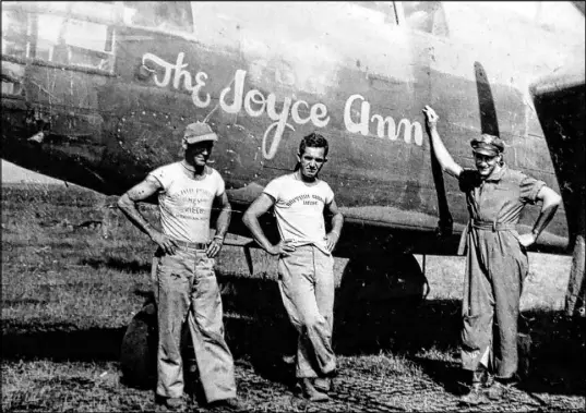  ??  ?? In this 1943 photo, James Parker, right, stands in front of his Douglas A-20 Havoc, with his wife’s name painted on the side.