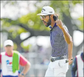  ?? Eric Gay The Associated Press ?? Akshay Bhatia celebrates a birdie on No. 18 to reach a playoff Sunday at the Texas Open. Bhatia secured his first trip to the Masters.