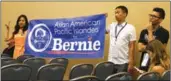  ?? AMY HE / CHINA DAILY ?? Asian-American supporters of Bernie Sanders at an AAPI Democratic leaders event t the Democratic National Convention in Philadelph­ia. The supporters started chanting pro-Bernie slogans in between speaker comments.