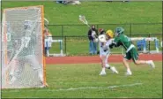  ?? THOMAS NASH — DIGITAL FIRST MEDIA ?? Pope John Paul II’s Mike Knapp (2) sends a shot toward goal while Methacton’s Jack Pellegrino (7) defends.