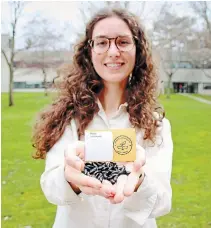  ?? BROCK UNIVERSITY ?? Master of sustainabi­lity candidate Alexandra Cotrufo helped to create Brock University's seed library.