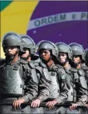  ?? ERALDO PERES/ THE ASSOCIATED PRESS ?? Brazilian soldiers take part in a military exercise July 22 in Brasilia. Authoritie­s have said 85,000 police officers and soldiers will be patrolling during the Olympics.