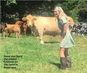  ??  ?? Have you herd the news? Grainne on the farm in Buncrana