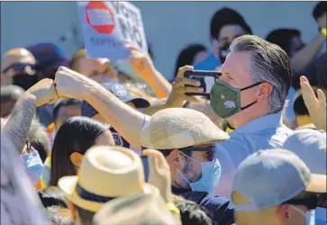  ?? MYUNG J. CHUN Los Angeles Times ?? CALIFORNIA Gov. Gavin Newsom, shown Sunday at Chef Robert Catering in Sun Valley, has attacked his opponents, warning that the recall election could saddle the state with an “anti-vax Republican governor.”