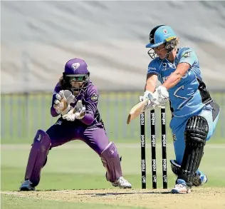  ?? GETTY IMAGES ?? Sophie Devine smashed 46 off 21 balls to help Adelaide to a record score.
