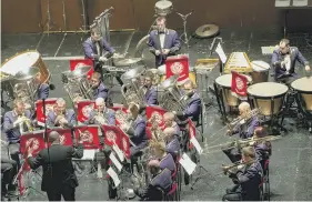  ?? PICTURES: LORNE CAMPBELL/GUZELIAN AND JAMES HARDISTY. ?? MUSIC TO MAKE: Top, members of Bradford Youth Brass Band all together for the first time in 13 months; above, the Brighouse and Rastrick Brass Band on stage in the Yorkshire championsh­ips.