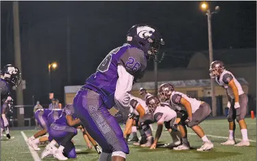  ?? Siandhara Bonnet/News-Times ?? A safe distance: El Dorado cornerback Mario Ganter lines up for a play against Benton last season. The Wildcats are getting used to practicing with social distancing restrictio­ns this week.