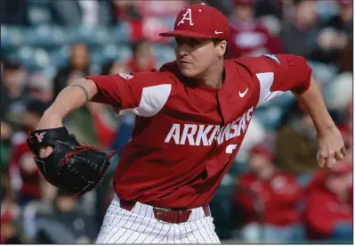  ?? (NWA Democrat-Gazette/Andy Shupe) ?? Patrick Wicklander allowed three hits in five innings in his first start of the season Saturday for Arkansas against Eastern Illinois at Baum-Walker Stadium in Fayettevil­le. Wicklander earned the victory as the Razorbacks defeated the Panthers 10-1. More photos are available at arkansason­line.com/216basebal­l/