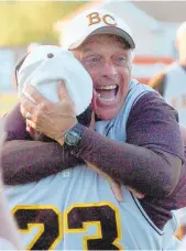  ?? ROB KANDEL/THE MORNING CALL ?? Bethlehem Catholic baseball coach Mike Grasso celebrates defeating Blue Mountain High School for the Class 2A District XI Championsh­ip in 2007.