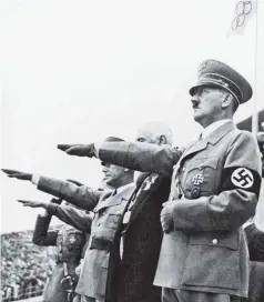  ?? PHOTO: GETTY IMAGES ?? Adolf Hitler and his staff salute the teams during the opening ceremony of the 1936 Olympic Games in Berlin.