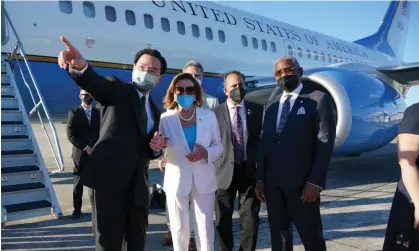  ?? Photograph: Anadolu Agency/Getty Images ?? Nancy Pelosi and her five-member Congress delegation on the runway prior to departing Taipei Songshan airport on Wednesday.