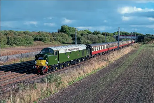  ?? Tom Mcatee ?? D213 Andania heads the Branch Line Society’s through Winwick while working ‘The Wirral Squirrel’ tour from Bidston to Crewe on October 3, with 47614 on the rear of the train.