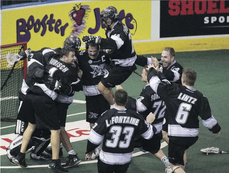  ?? GREG SOUTHAM ?? Members of the Edmonton Rush celebrate winning the NLL Champions Cup in 2015 at Rexall Place. The franchise moved to Saskatoon following its title win.